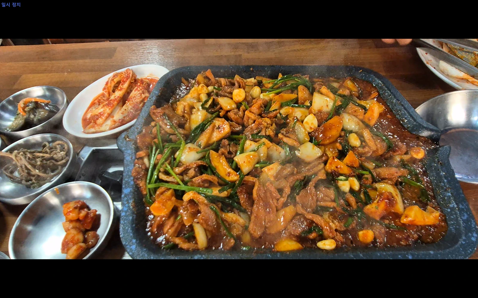Duck jumulleok cooking on the griddle