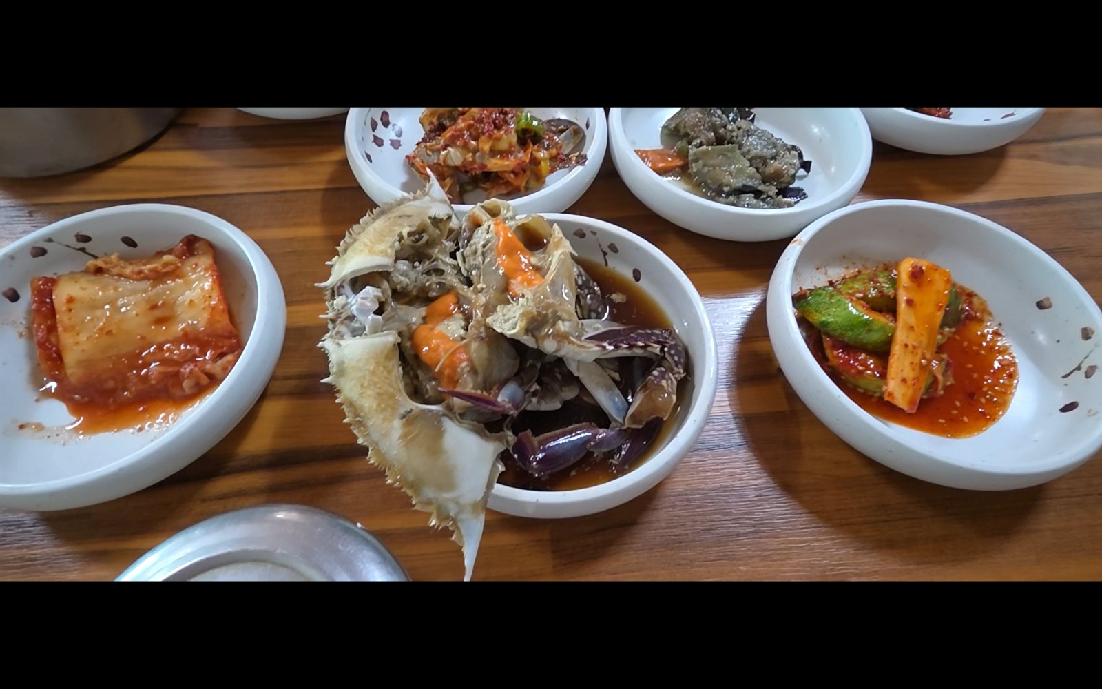Soy-marinated crab and side dishes